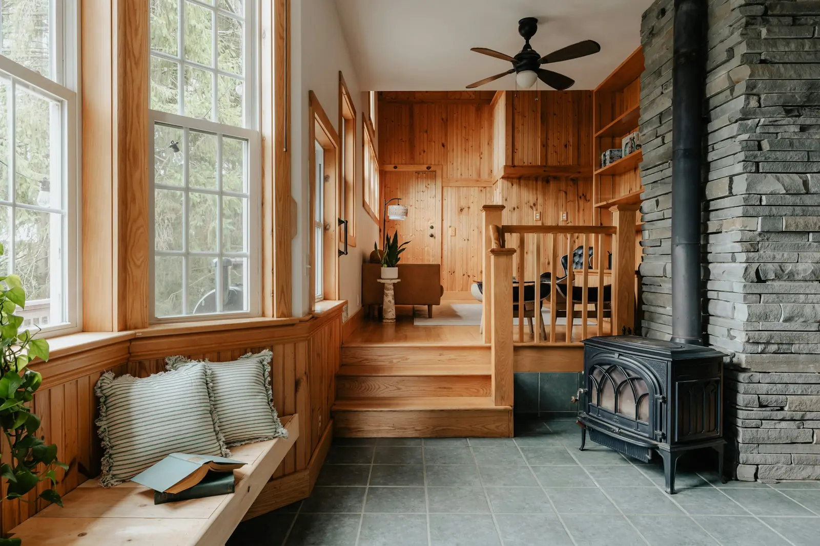 Window seat reading nook with pillows